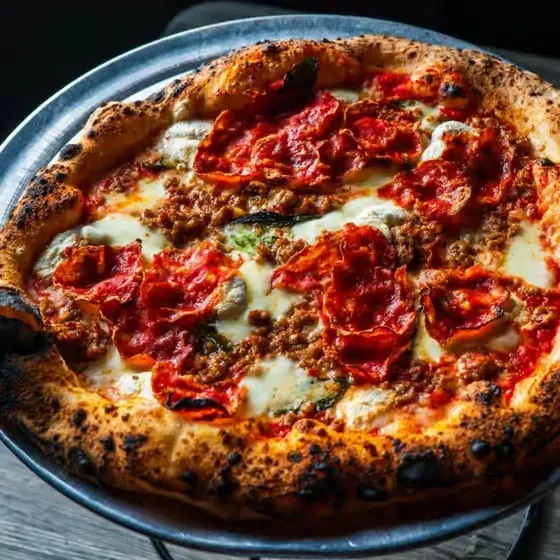 Enjoying Our Pizza at its Best